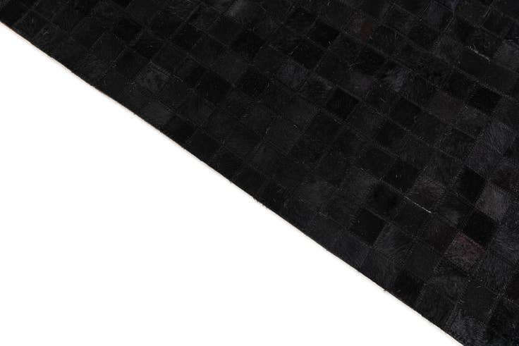 Detail image of 5' x 7' 11 Cowhide Stocks Rug