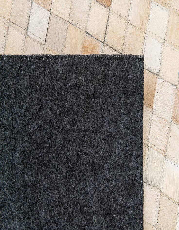 Detail image of 5' 2 x 8' Cowhide Stocks Rug