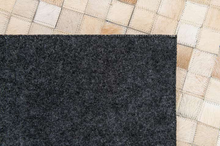 5' 2 x 8' Cowhide Stocks Rug