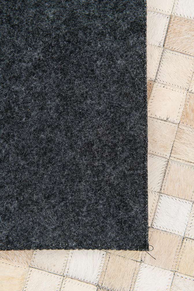 5' x 7' 11 Cowhide Stocks Rug