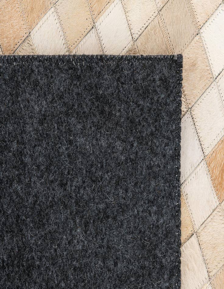 Detail image of 5' 2 x 7' 11 Cowhide Stocks Rug