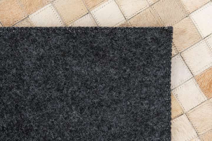 5' 2 x 7' 11 Cowhide Stocks Rug