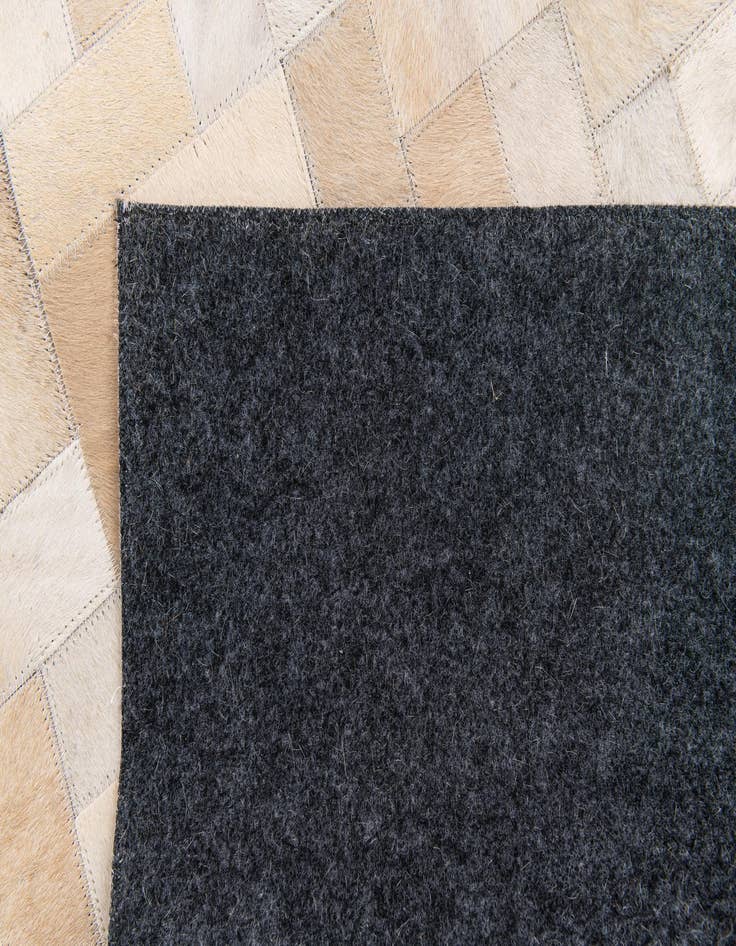 Detail image of 5' x 7' 11 Cowhide Stocks Rug