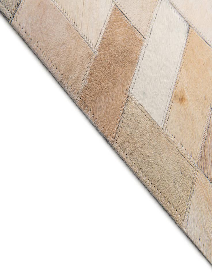 Detail image of 5' x 7' 11 Cowhide Stocks Rug