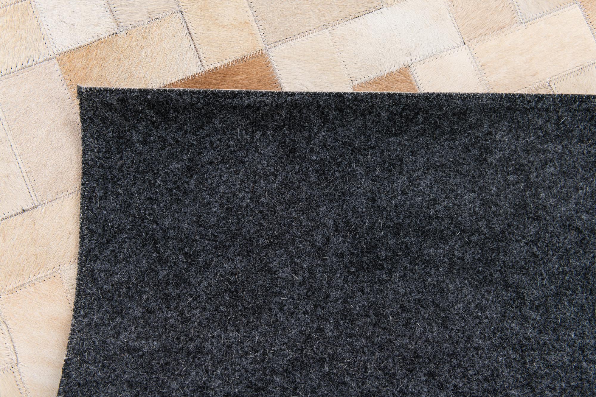 5' x 7' 11 Cowhide Stocks Rug