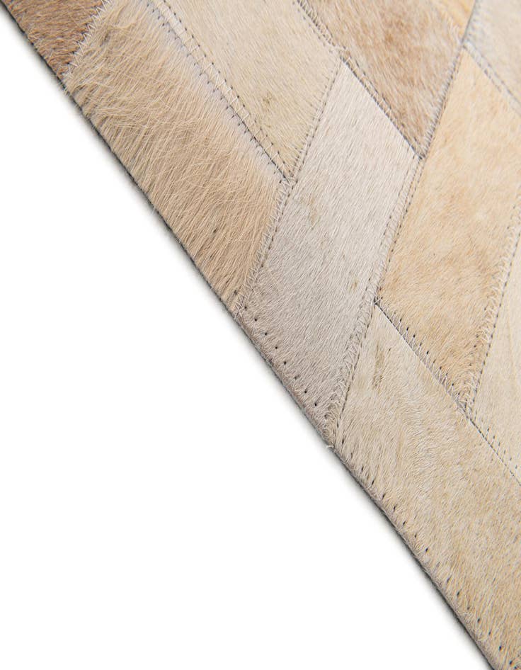 Detail image of 5' x 7' 11 Cowhide Stocks Rug