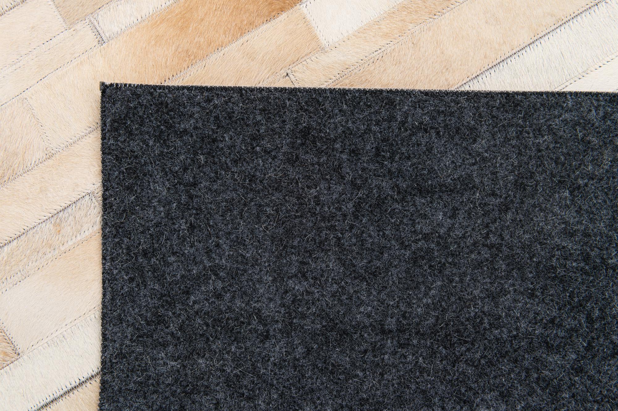 5' x 8' Cowhide Stocks Rug