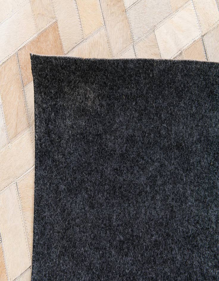 Detail image of 4' 11 x 7' 11 Cowhide Stocks Rug
