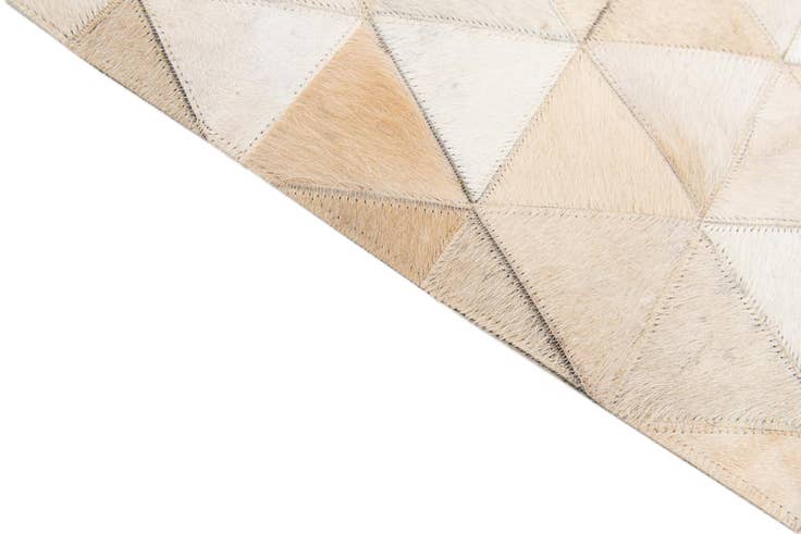 Detail image of 5' 1 x 8' 1 Cowhide Stocks Rug