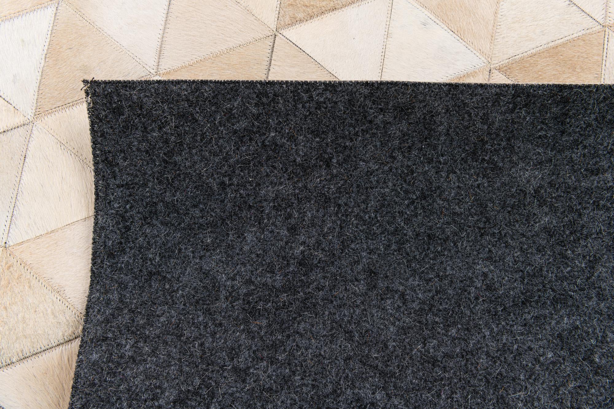 5' 1 x 8' 1 Cowhide Stocks Rug