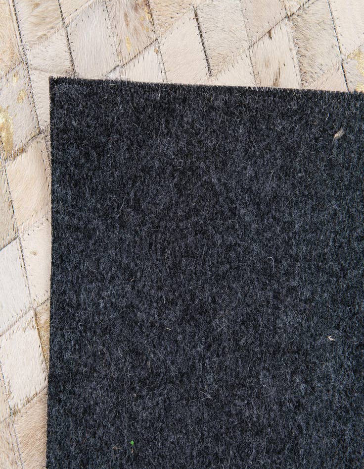 Detail image of 5' 4 x 7' 5 Cowhide Stocks Rug