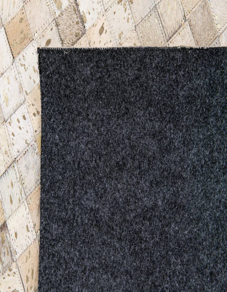 Detail image of 5' 4 x 8' 1 Cowhide Stocks Rug