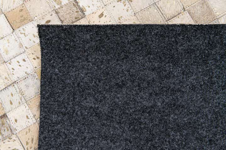 5' 4 x 8' 1 Cowhide Stocks Rug