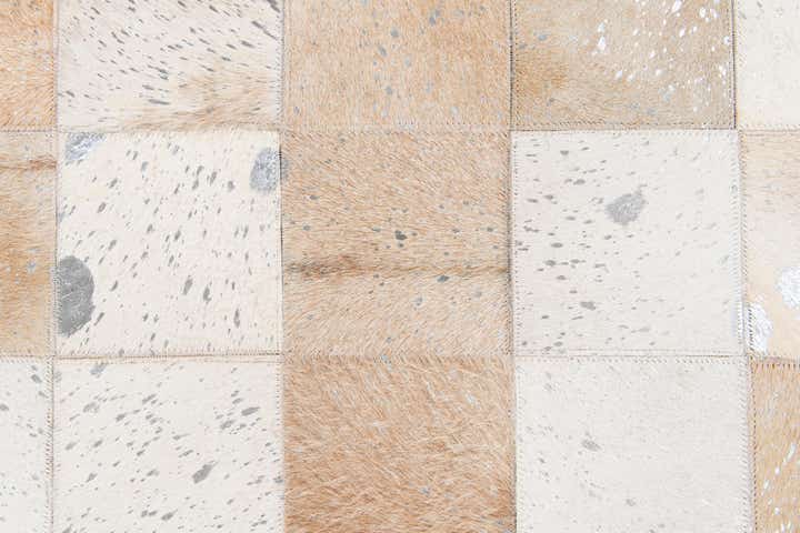 5' 2 x 8' 1 Cowhide Stocks Rug