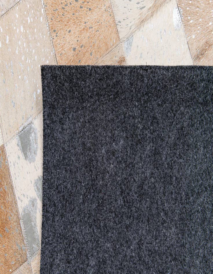 Detail image of 5' 2 x 8' 1 Cowhide Stocks Rug