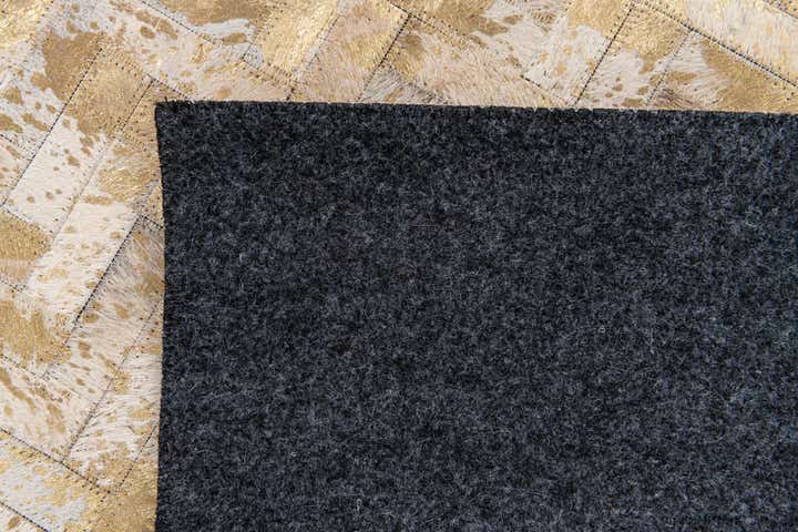 5' 5 x 7' 6 Cowhide Stocks Rug