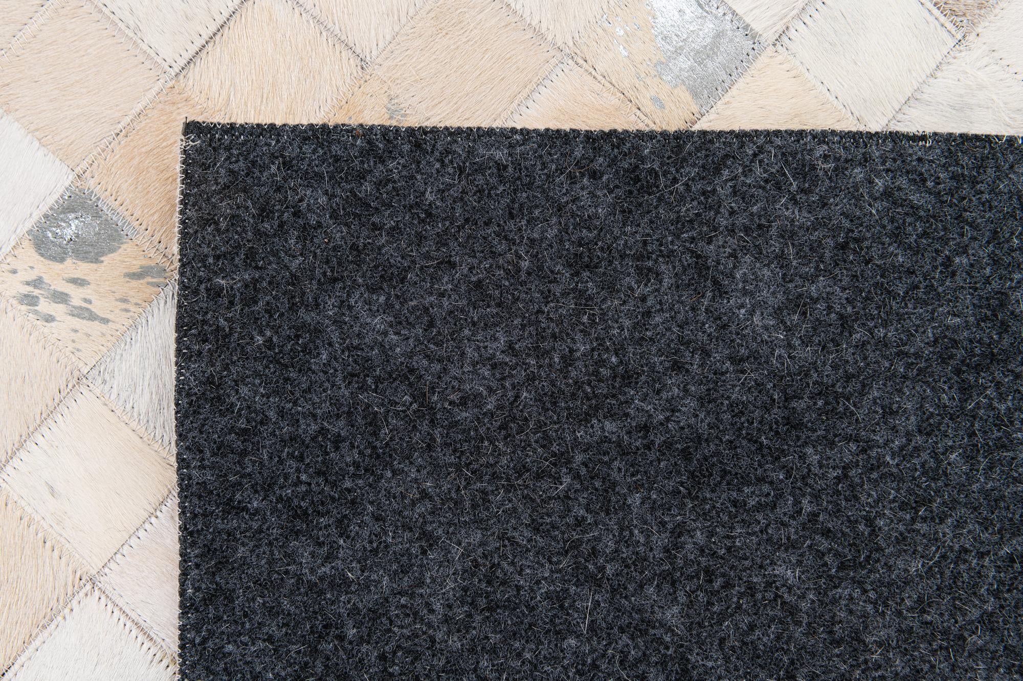 8' 1 x 9' 10 Cowhide Stocks Rug