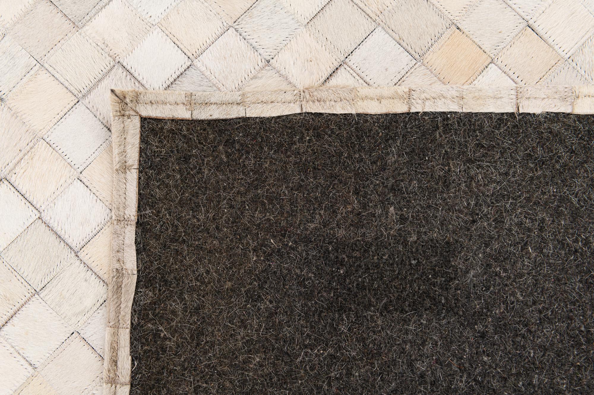 5' 3 x 7' 5 Cowhide Stocks Rug