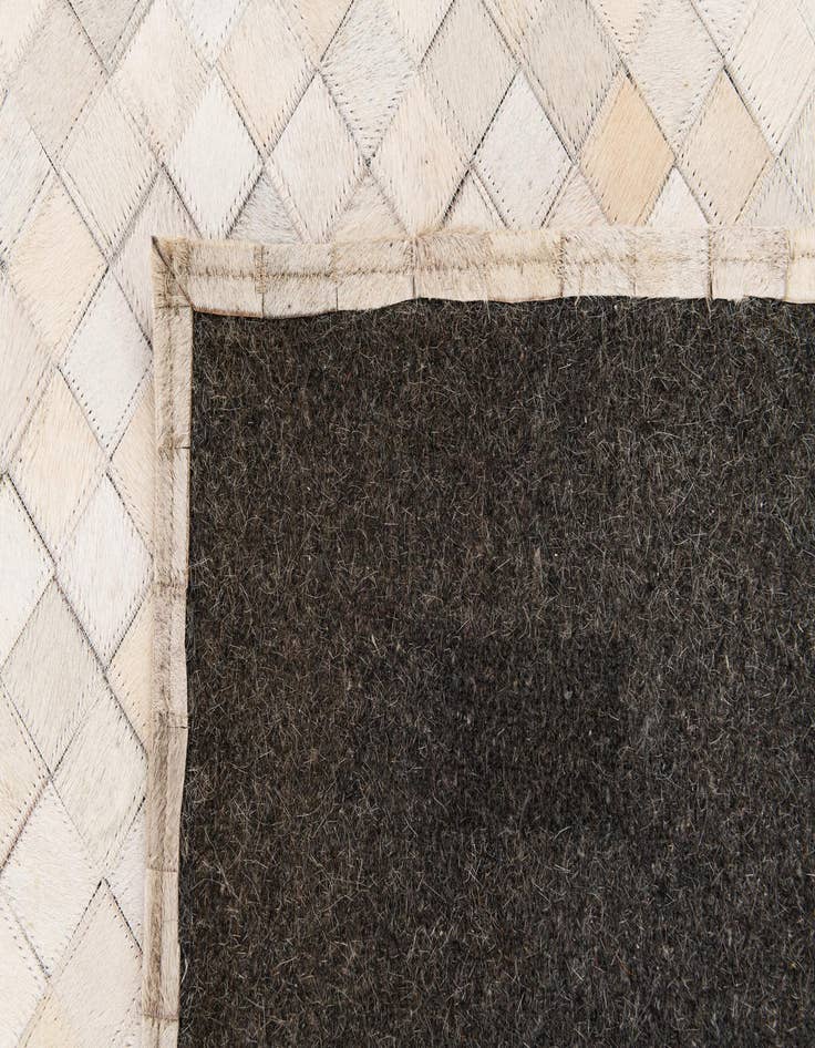 Detail image of 5' 3 x 7' 5 Cowhide Stocks Rug