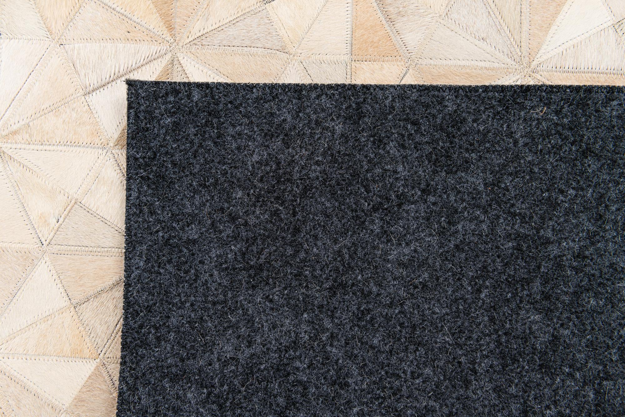 4' 8 x 6' 7 Cowhide Stocks Rug