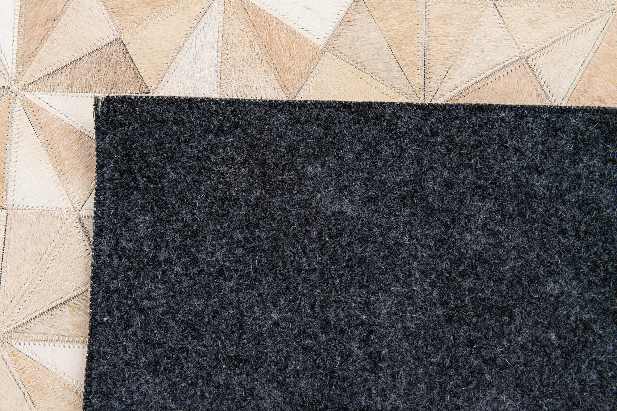 4' 8 x 6' 7 Cowhide Stocks Rug
