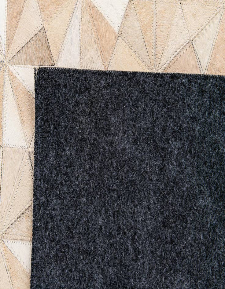 Detail image of 4' 8 x 6' 7 Cowhide Stocks Rug