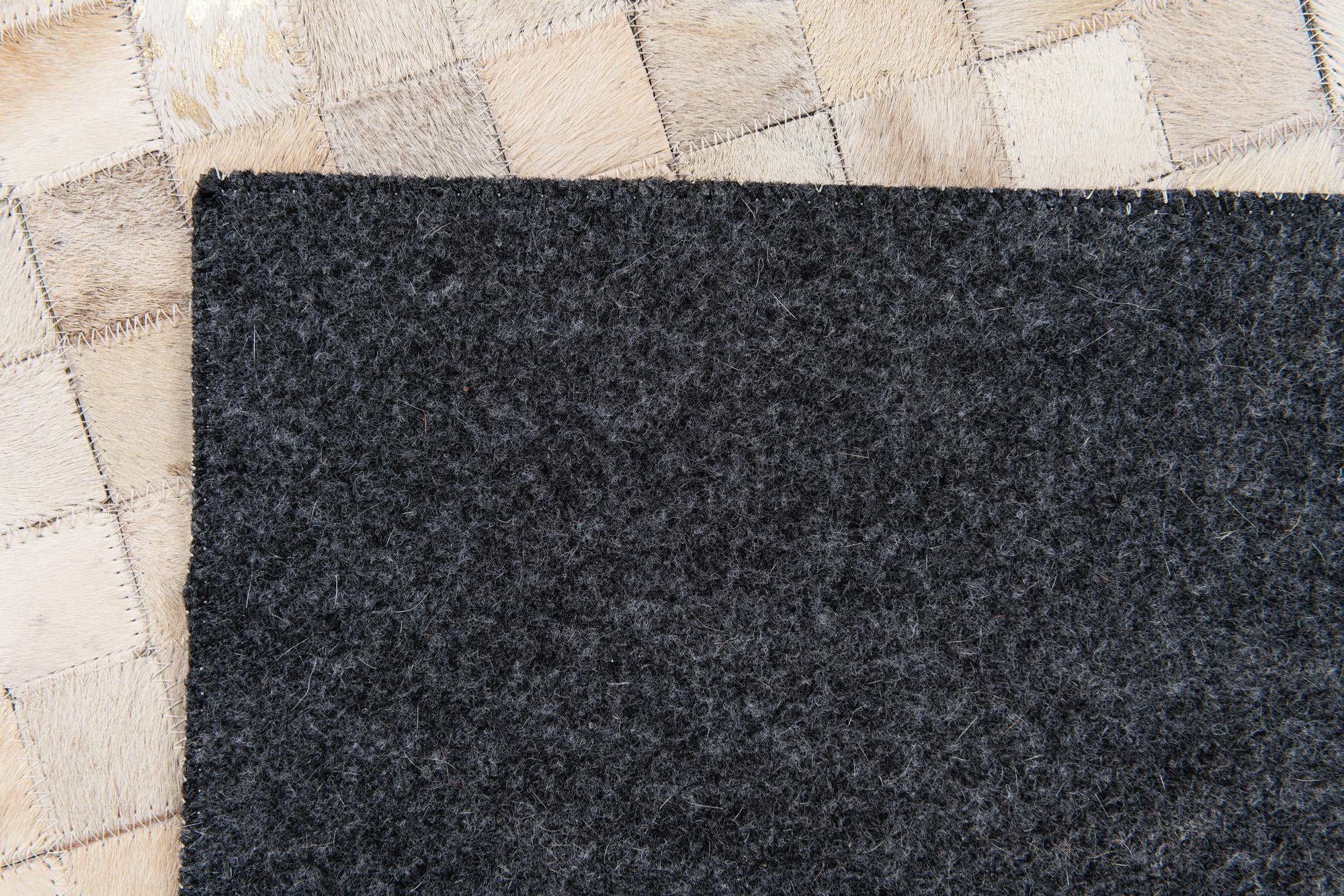 4' 1 x 5' 8 Cowhide Stocks Rug