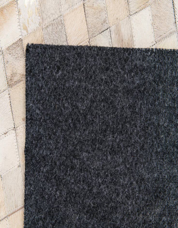 Detail image of 4' 1 x 5' 8 Cowhide Stocks Rug