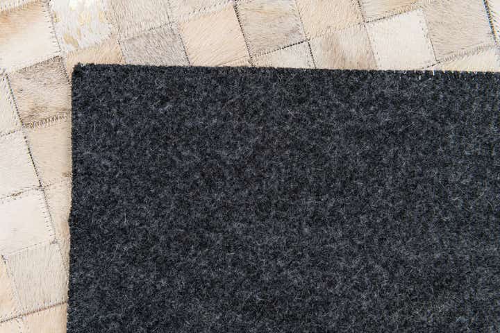 4' 1 x 5' 8 Cowhide Stocks Rug