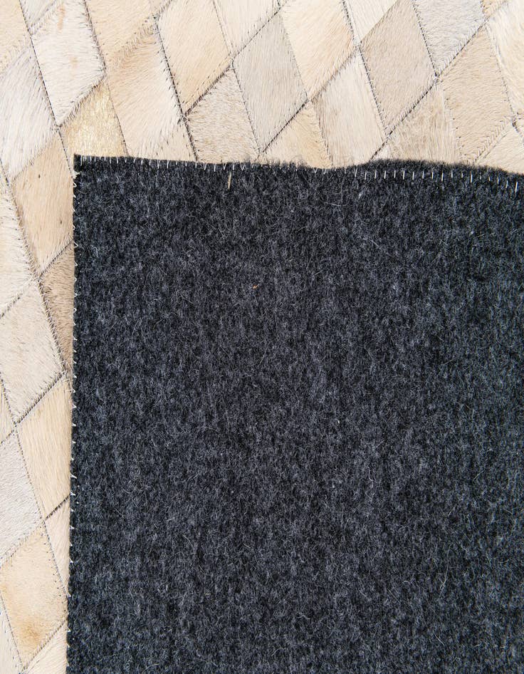 Detail image of 4' x 5' 8 Cowhide Stocks Rug