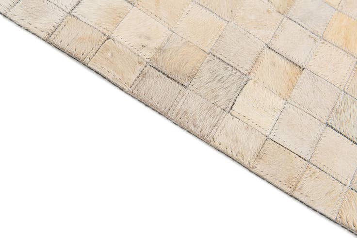 Detail image of 4' 1 x 5' 8 Cowhide Stocks Rug
