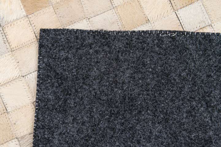 4' 1 x 5' 8 Cowhide Stocks Rug