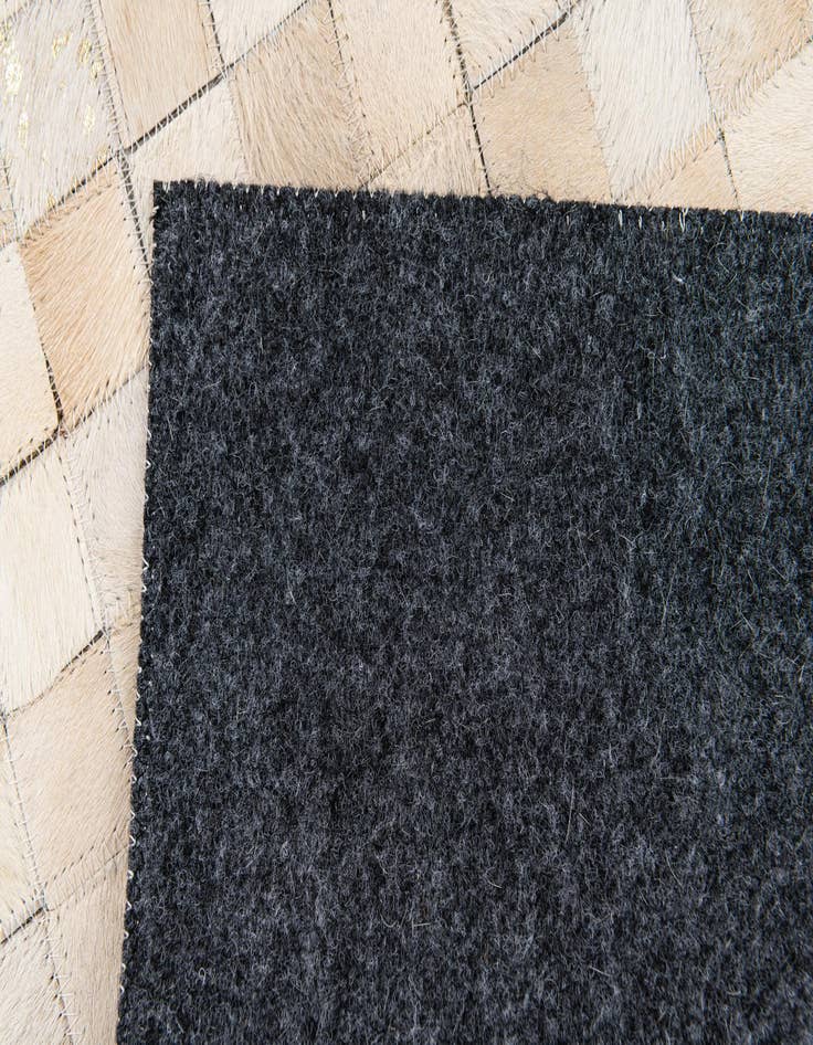 Detail image of 4' x 5' 8 Cowhide Stocks Rug