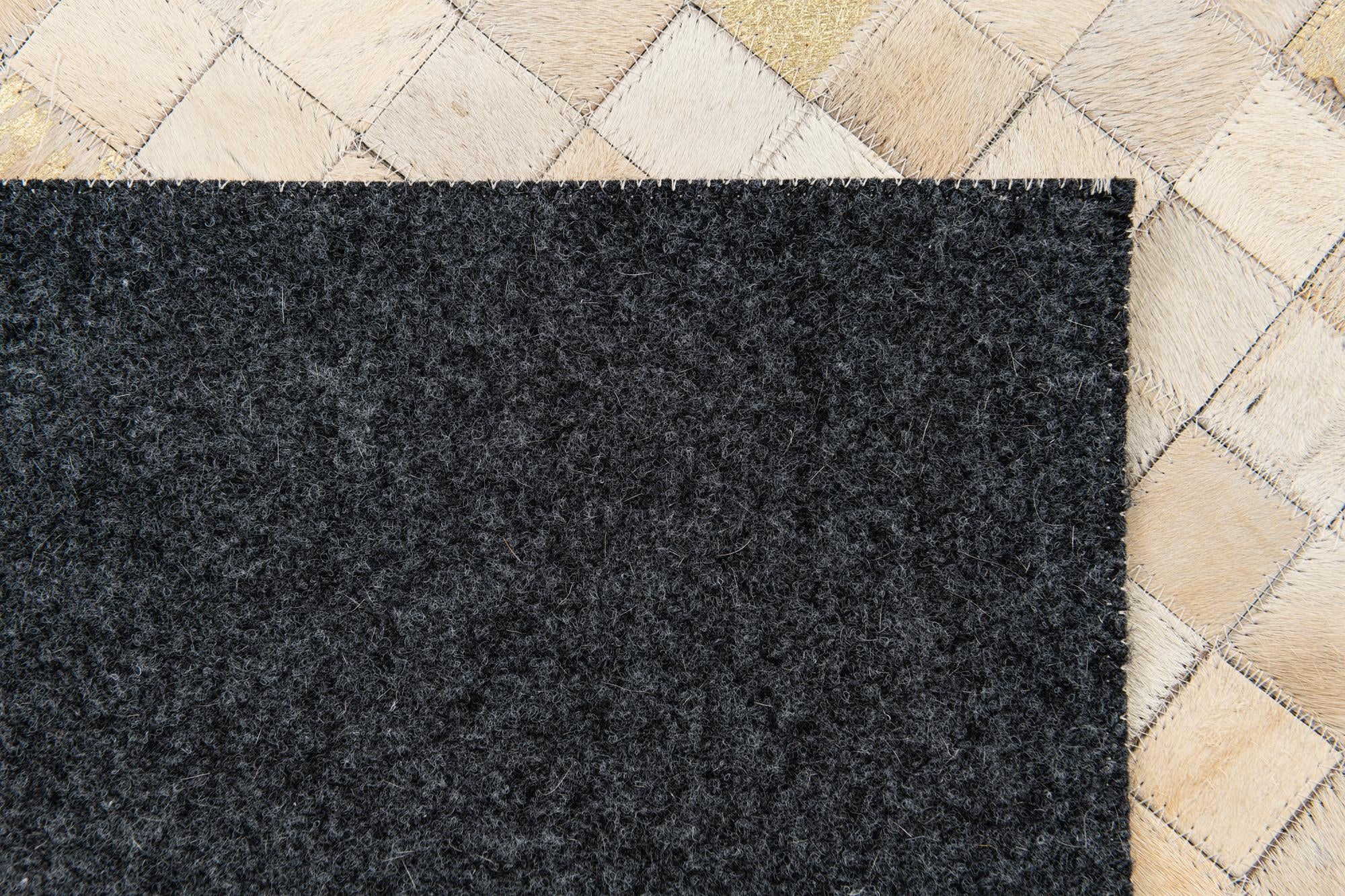 4' 1 x 5' 8 Cowhide Stocks Rug