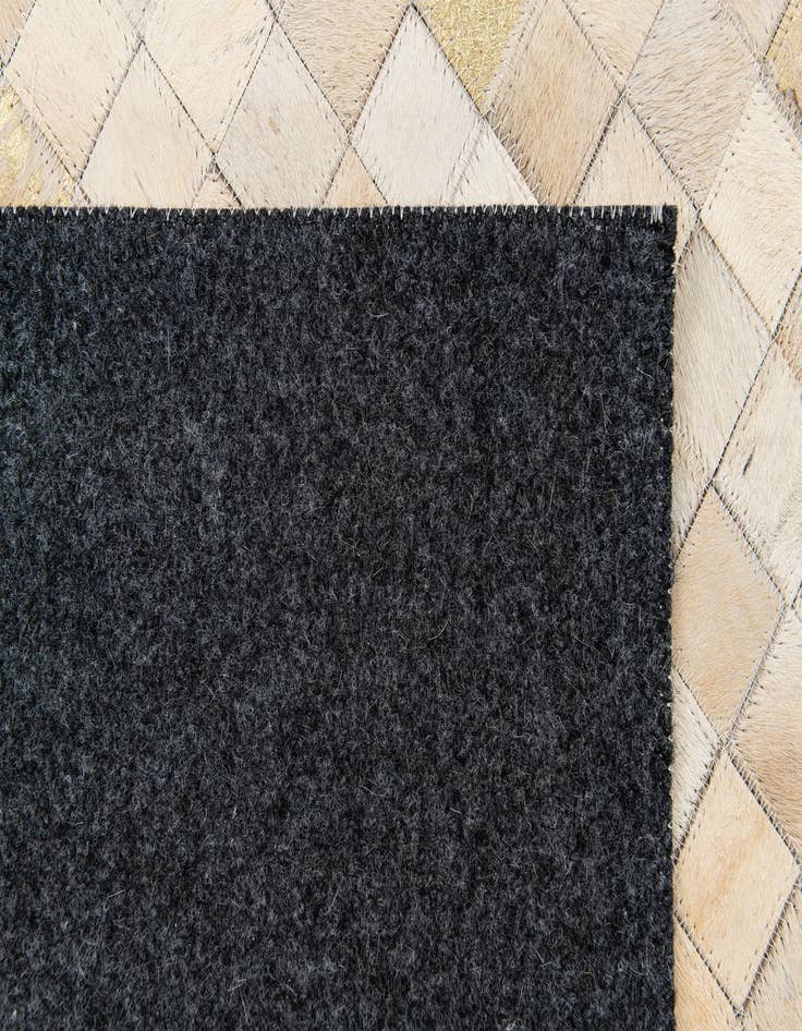 Detail image of 4' 1 x 5' 8 Cowhide Stocks Rug