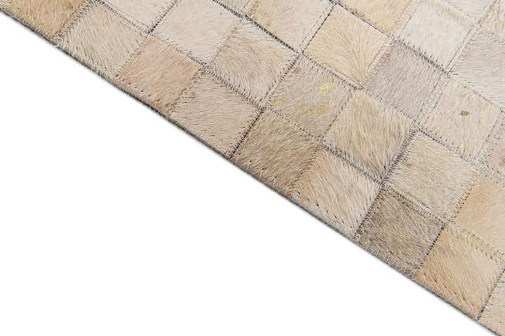 4' x 5' 7 Cowhide Stocks Rug