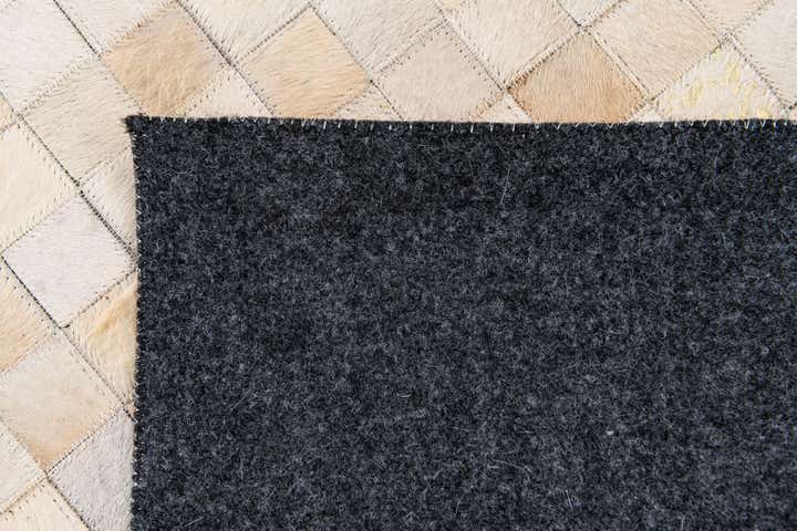 4' x 5' 7 Cowhide Stocks Rug