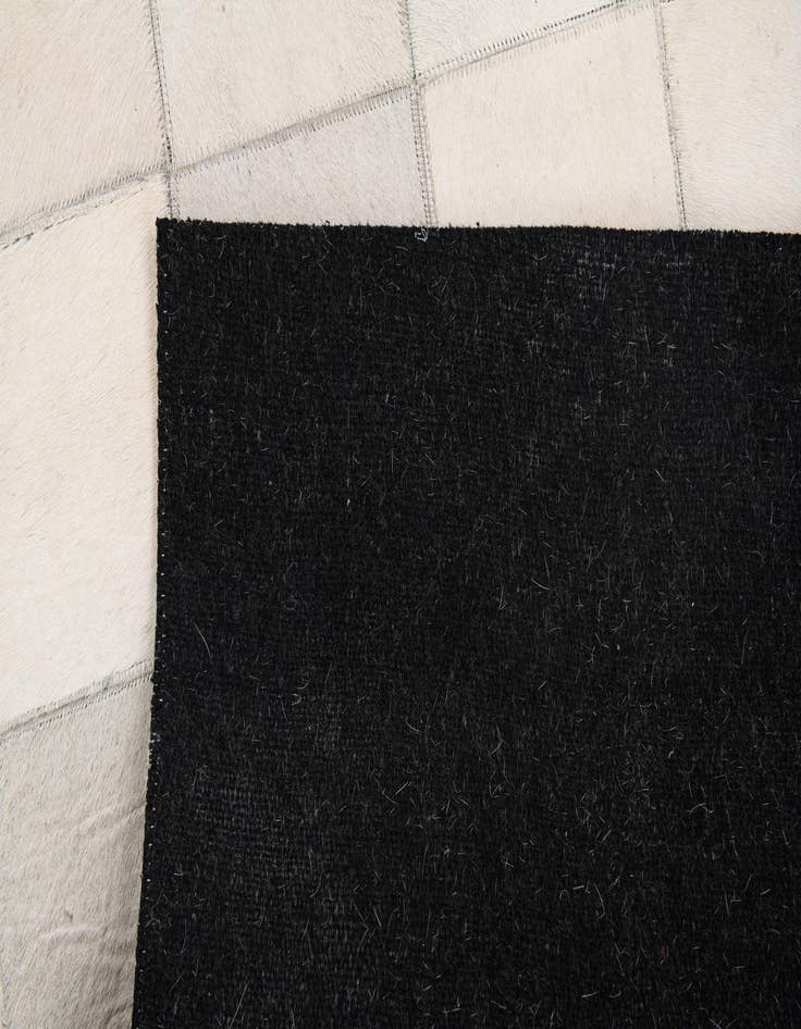 Detail image of 4' x 5' 10 Cowhide Stocks Rug