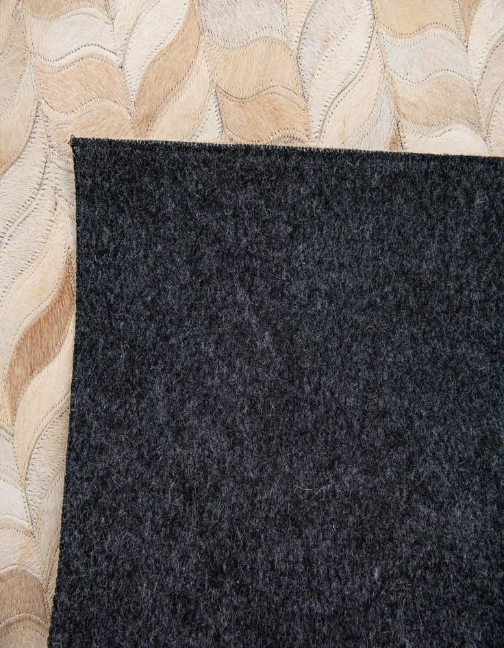 Detail image of 4' x 5' 11 Cowhide Stocks Rug