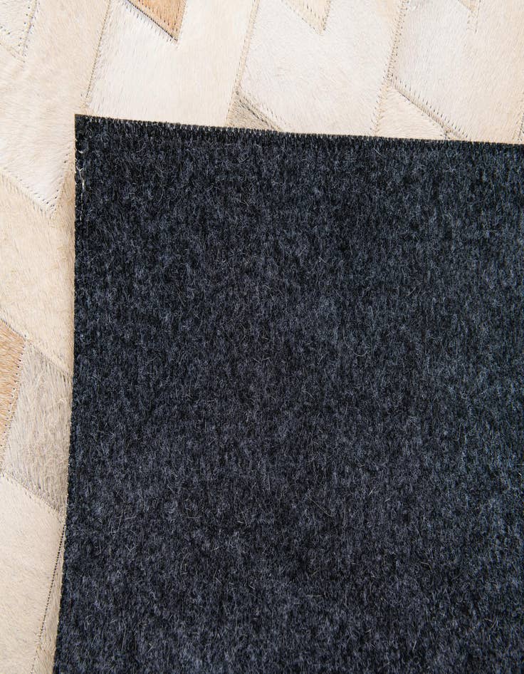 Detail image of 4' 1 x 6' Cowhide Stocks Rug