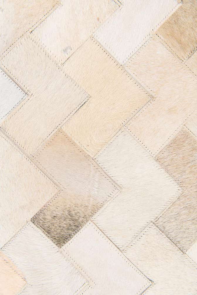 3' 9 x 5' 10 Cowhide Stocks Rug