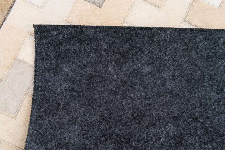 3' 9 x 5' 10 Cowhide Stocks Rug