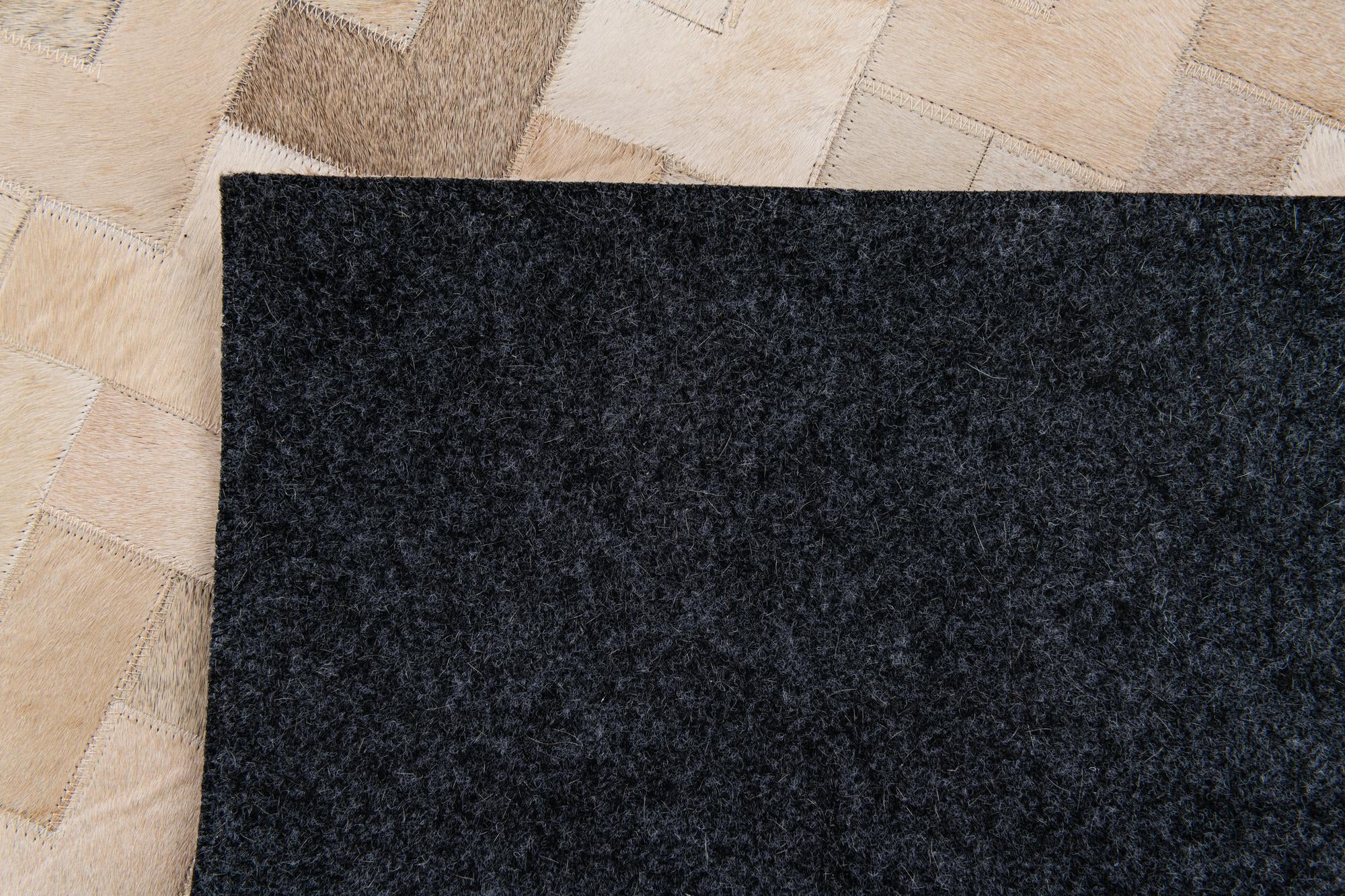 4' 2 x 5' 11 Cowhide Stocks Rug