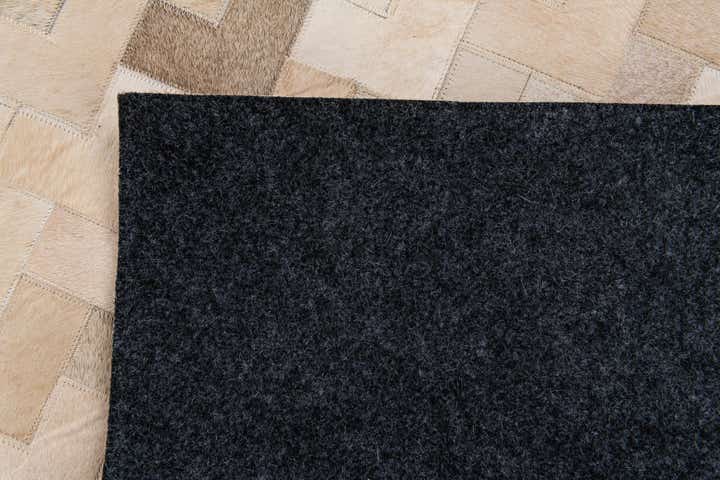 4' 2 x 5' 11 Cowhide Stocks Rug