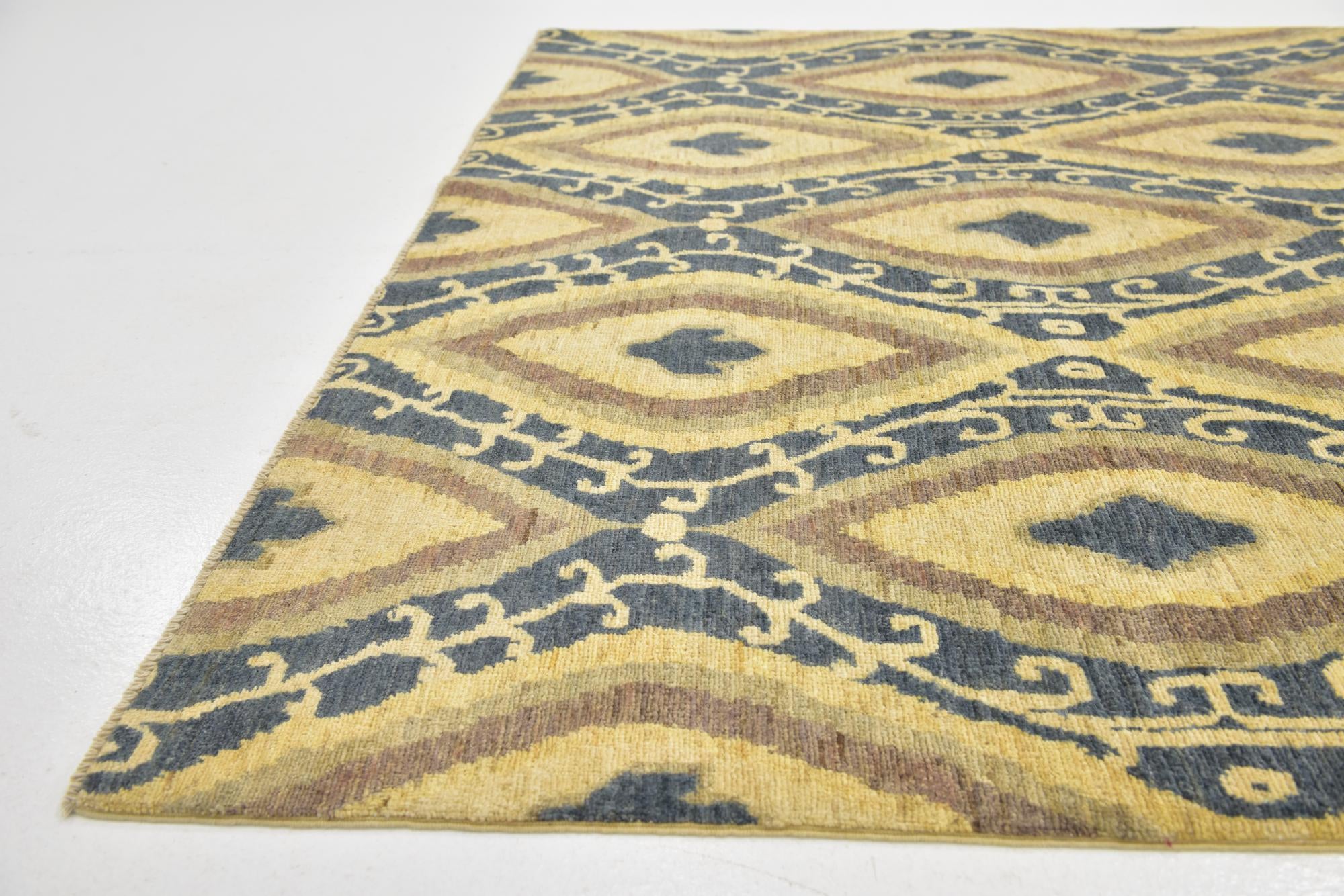 5' x 6' 5 Hand Knotted Ikat Rug