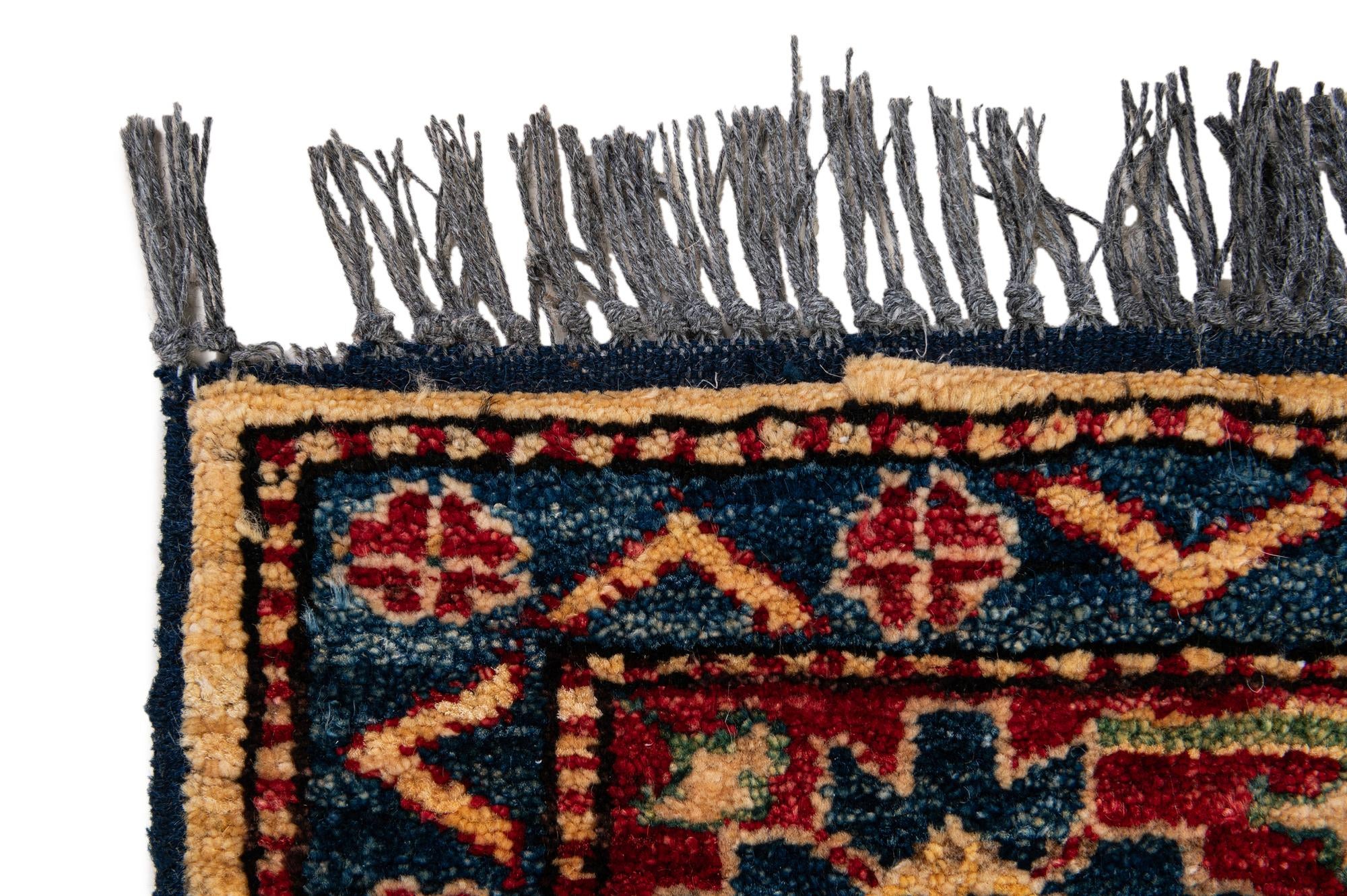 4' 9 x 8' 4 Hand Knotted Kazak Wool Rug