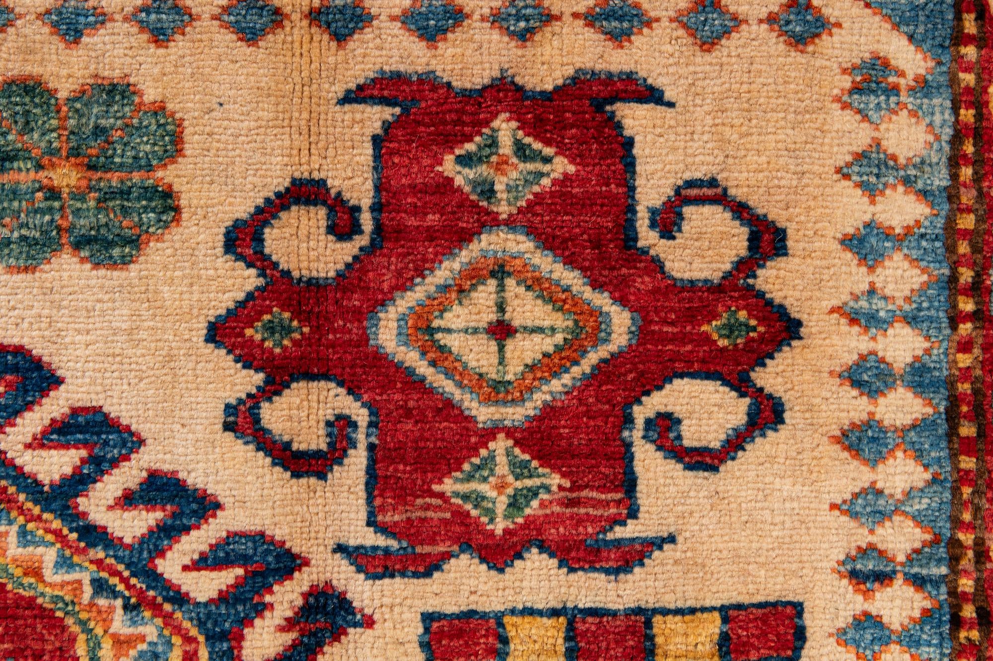 5' 10 x 8' 6 Hand Knotted Kazak Wool Rug