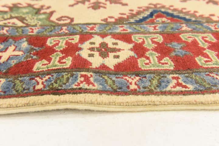 3' 11 x 5' 9 Hand Knotted Kazak Rug