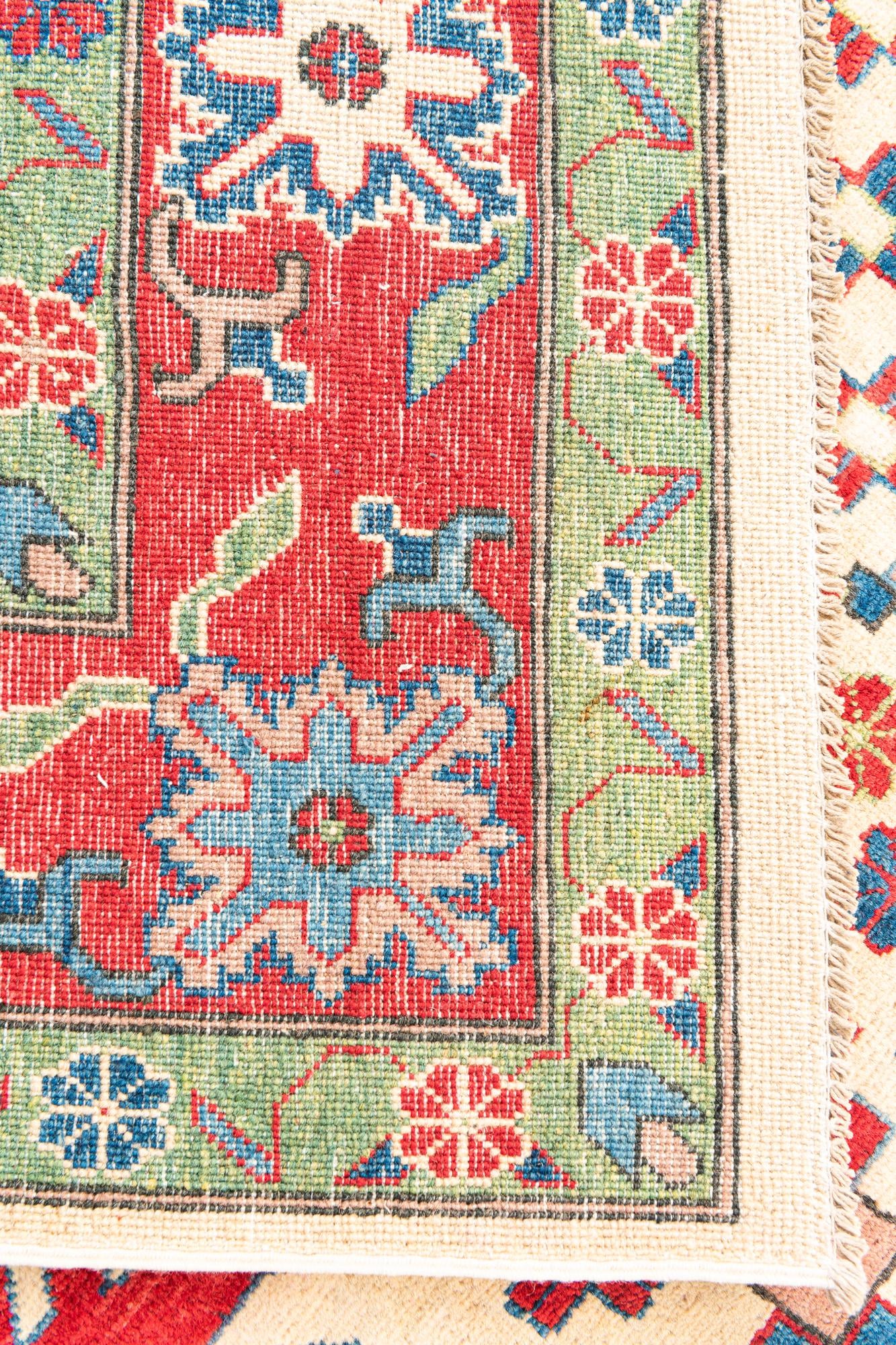 5' 7 x 9' Hand Knotted Kazak Rug