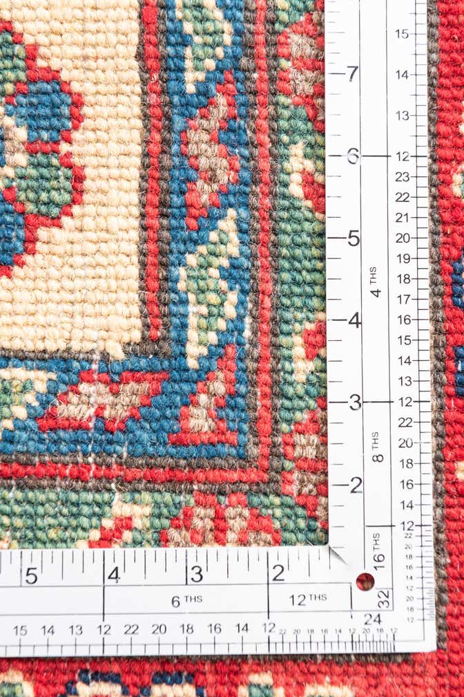 6' x 8' 5 Hand Knotted Kazak Rug